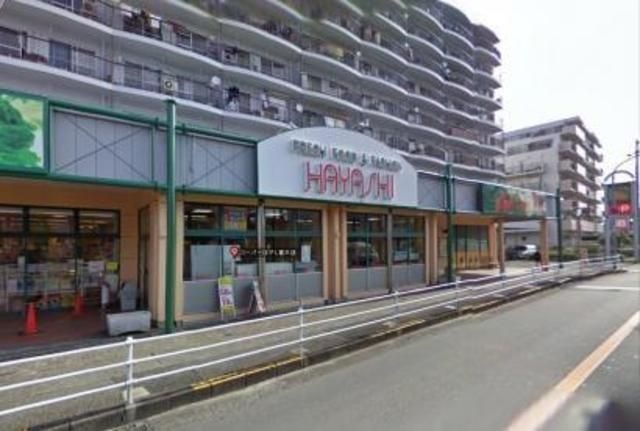 写真：万代堺草部店