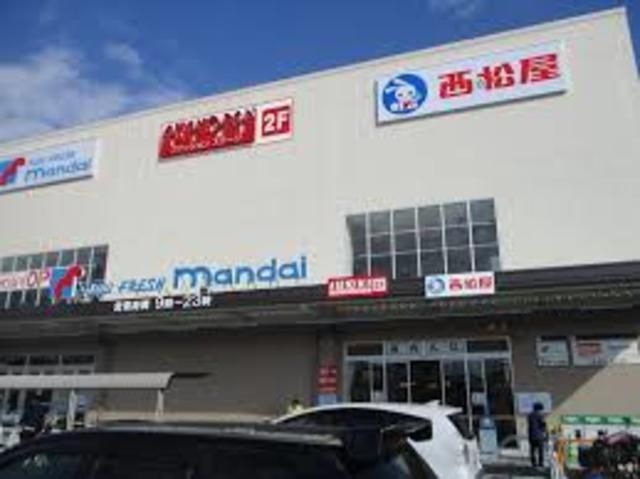 万代堺高須店