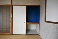 押入