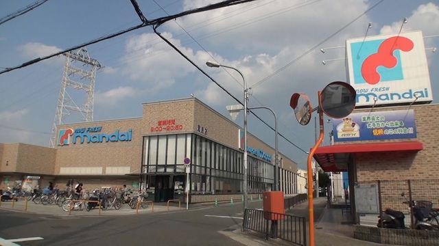 万代萱島店