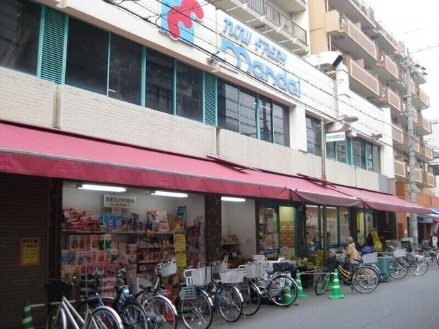 万代塚本店