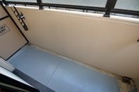 暖かな日差しのふりそそぐバルコニー