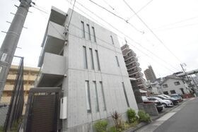 Le perchoir白壁の外観