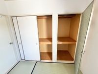 押入