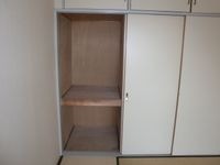 押入