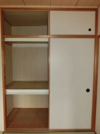 押入