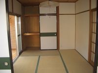押入
