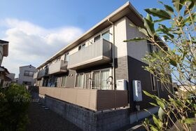 ガーデンズ多治米A棟の外観